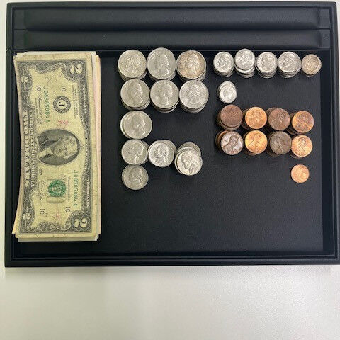 アメリカの紙幣と硬貨で合わせて112ドル27セントお買取りさ