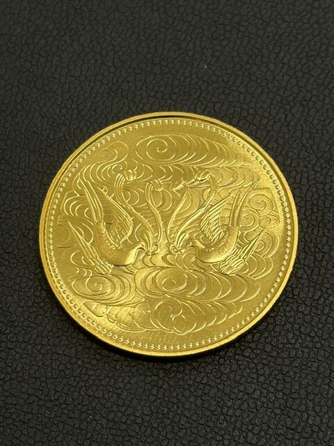天皇陛下在位60年記念10万円金貨